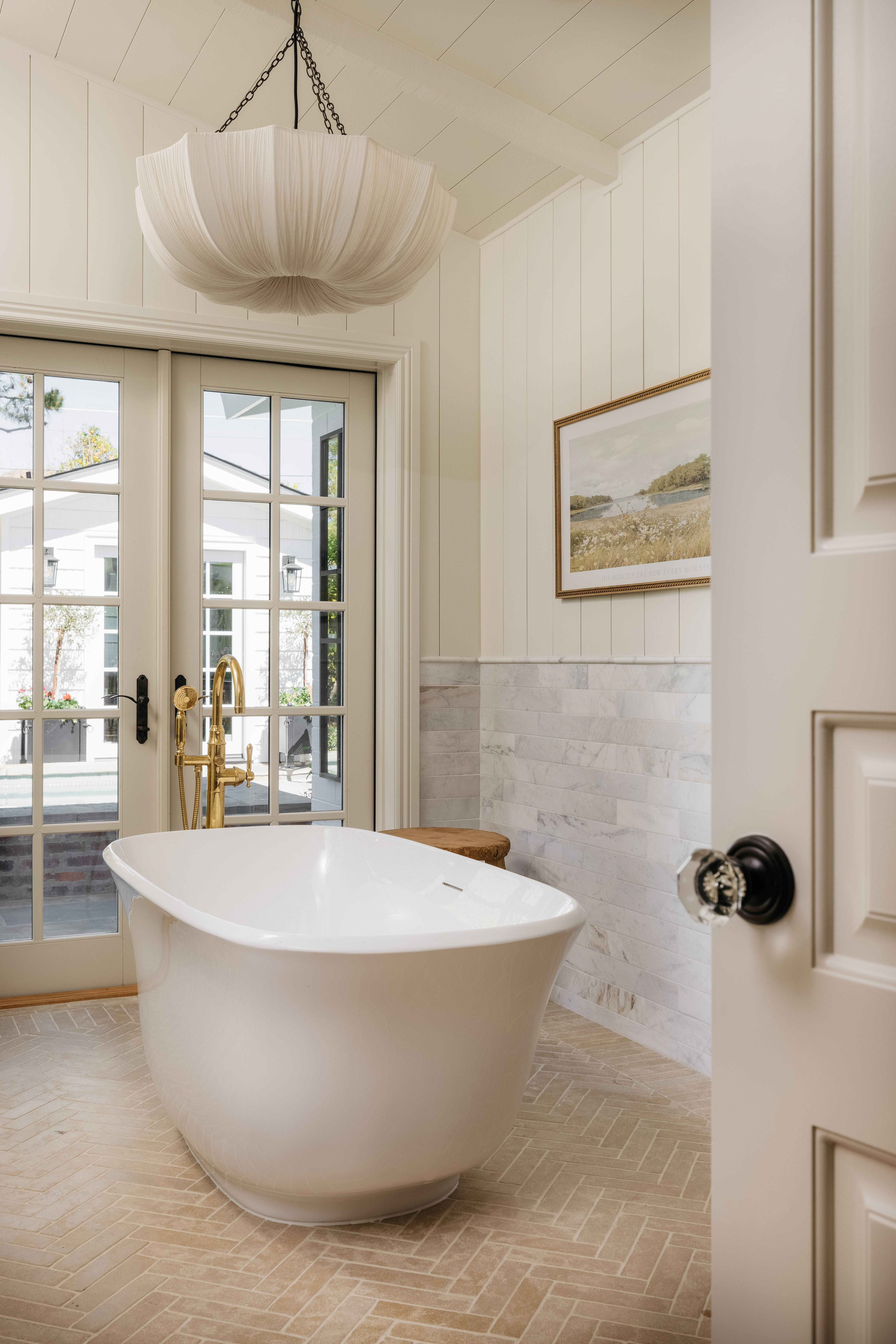 Primary bath tub looking in through door