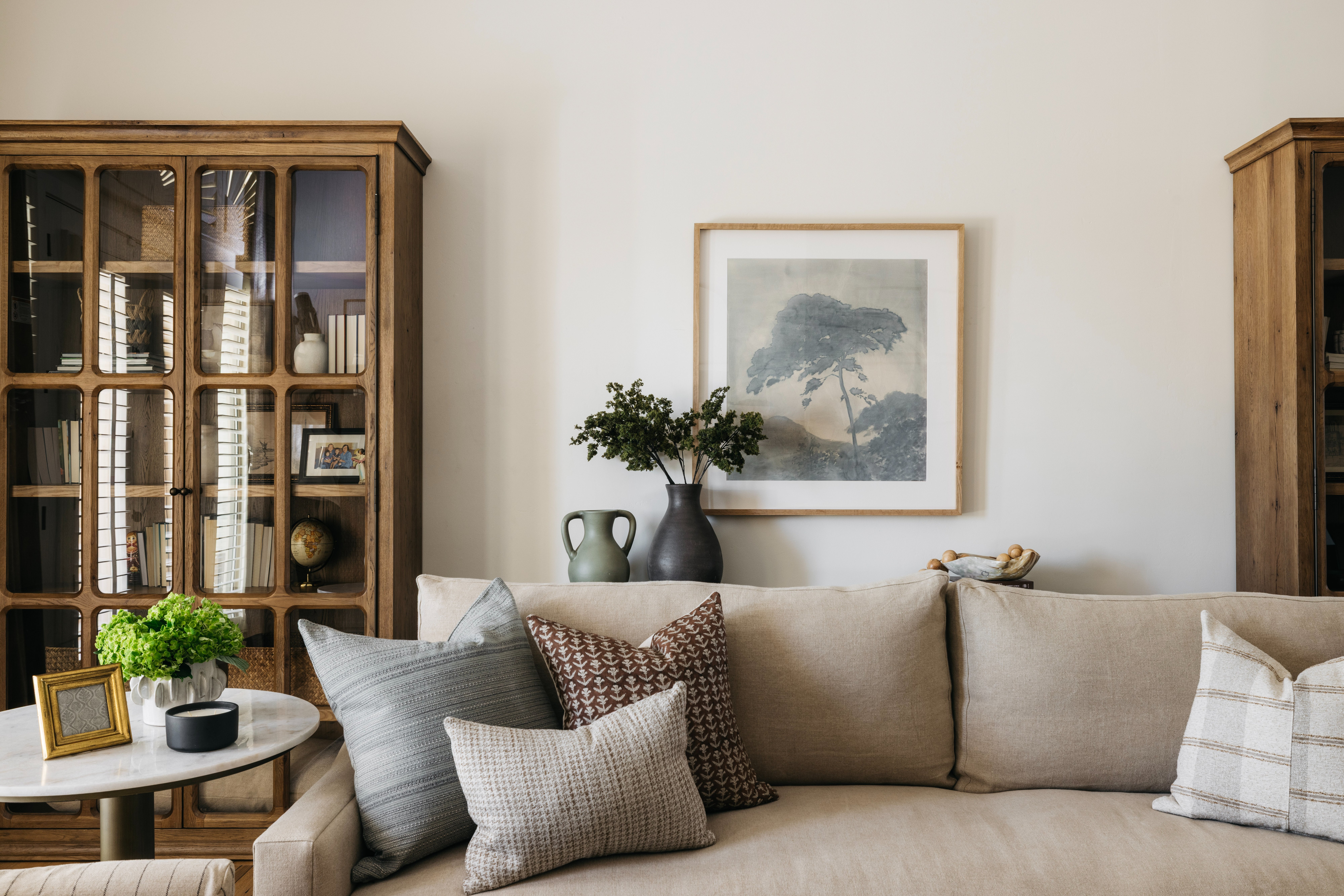 Sofa with cabinet and art, Heirloom House